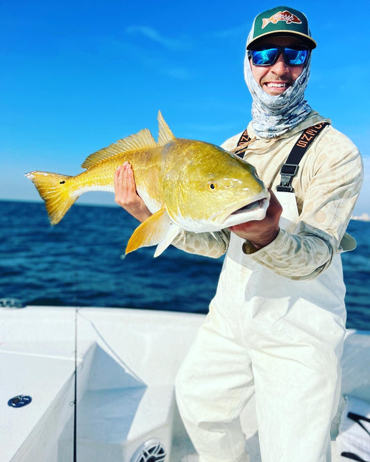 CAPT. AUSTIN with BLUE ISLAND INSHORE FISHING CHARTERS